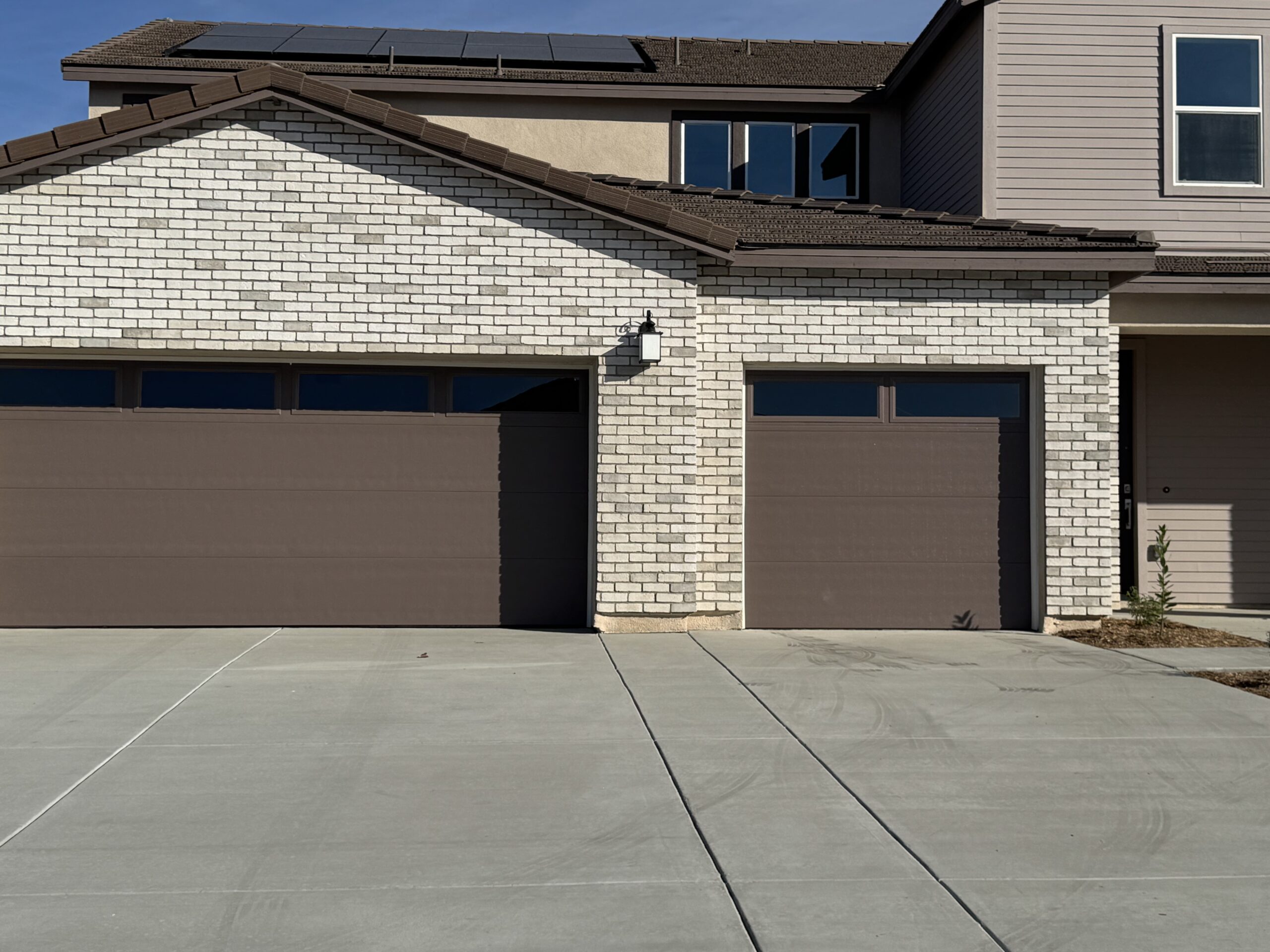 Should You Repair or Replace a Garage Door After Earthquake Damage