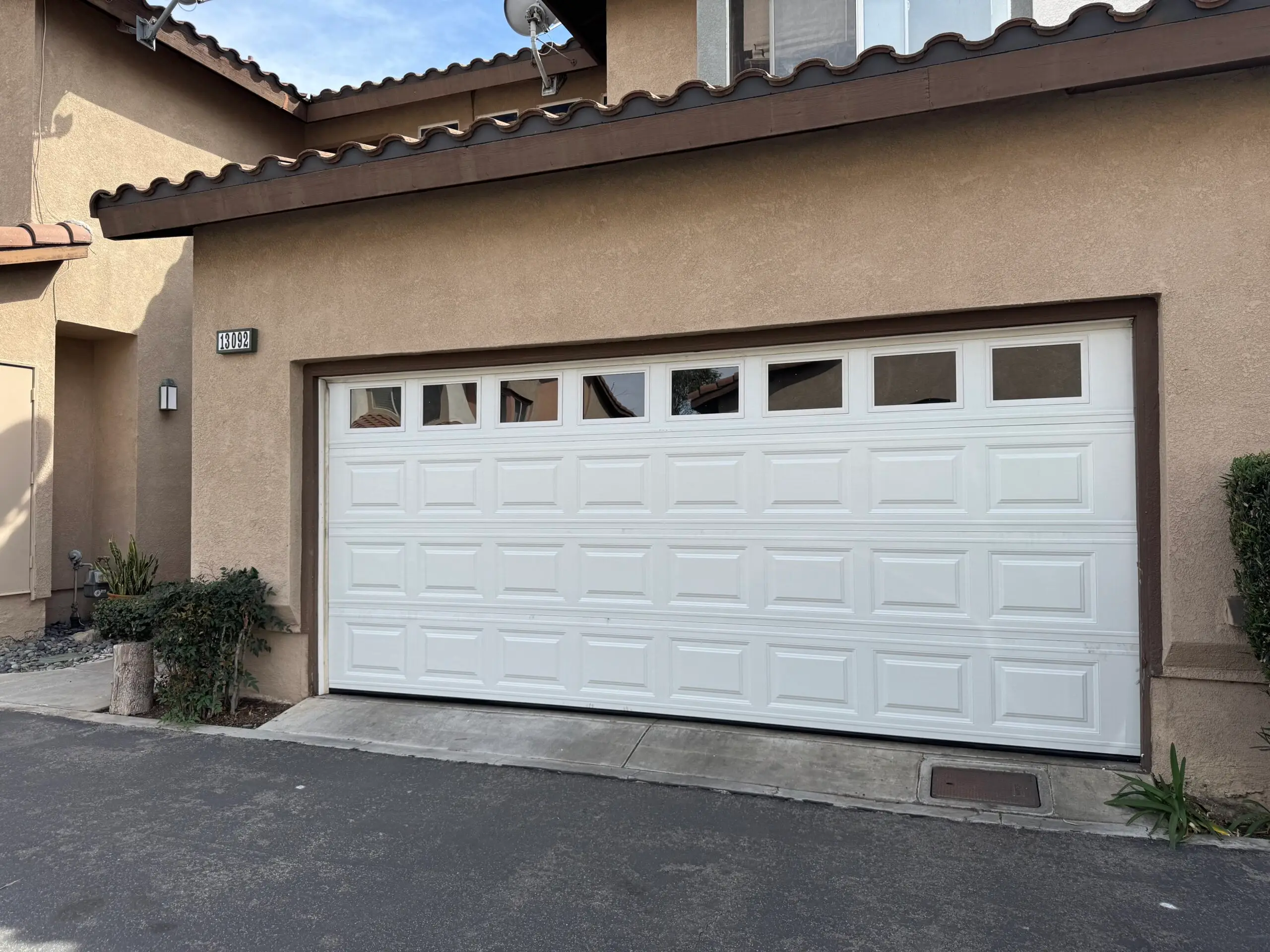 Garage door motor replacement signs inspection by Cali Pros Garage Door showing malfunction indicators